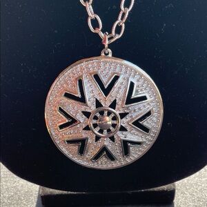 Lisner Vintage Necklace with round silver-tone filigree open-work pendant